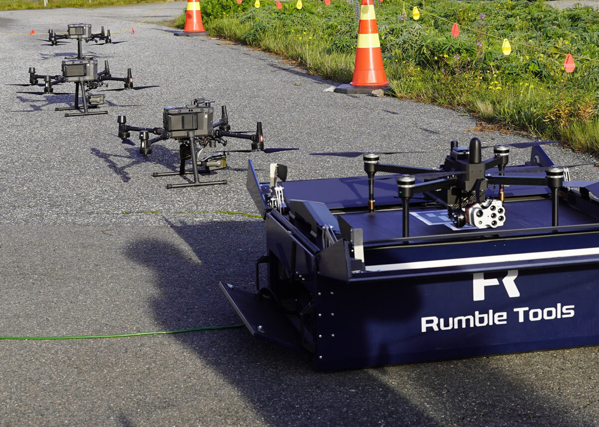 A fleet of drones prepared for the flight campaign in the FireMan demonstrations, including three DJI Matrice 300 or 350 and RumbleTools HK drone-in-a-box system. Photo: Eija Honkavaara