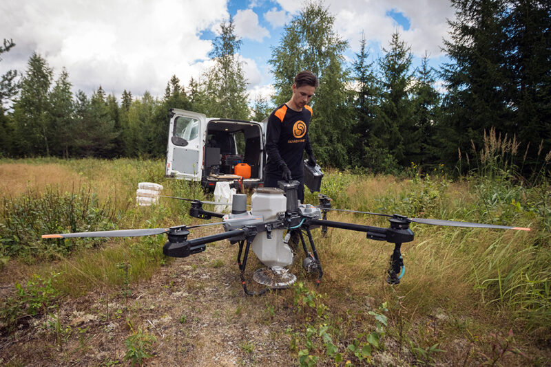 A drone on the ground and a man beside it. Photo: Silvadrones